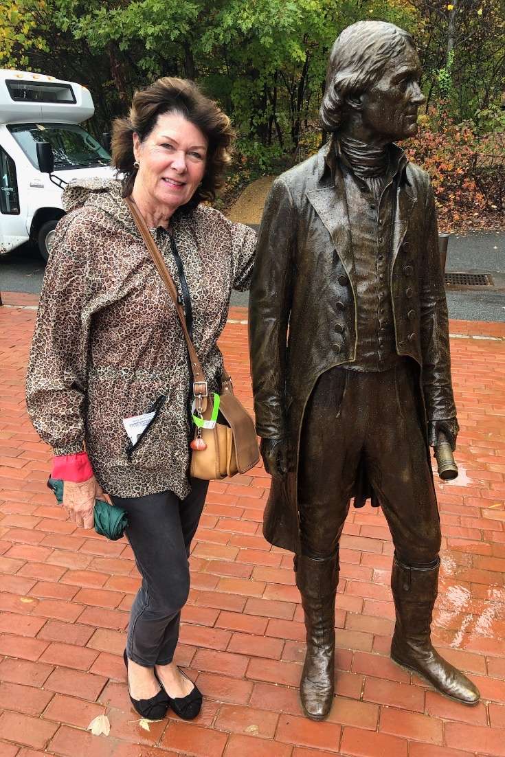 Robin with a colonial statue; Mid-atlantic-region